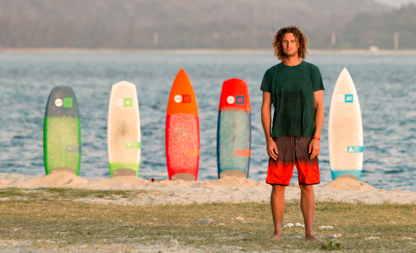 Sky Solback with a selection from the 2016 North Surfboard line. Left to right, the boards are arranged for their ideal wave conditions from small to large.