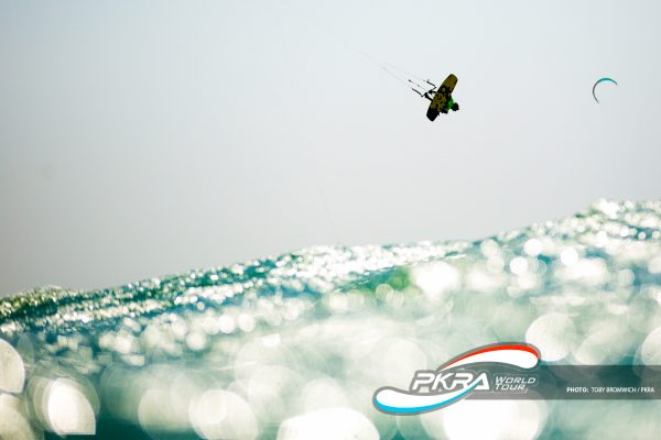 “On a windy, choppy day, back when the competition box was much larger, I was flat out swimming between heats to gain the ground that I drifted. Shot backlit into the sun with my head just above water, the sea sparkled for this KGB by Carlos Mario.” - Toby Bromwich